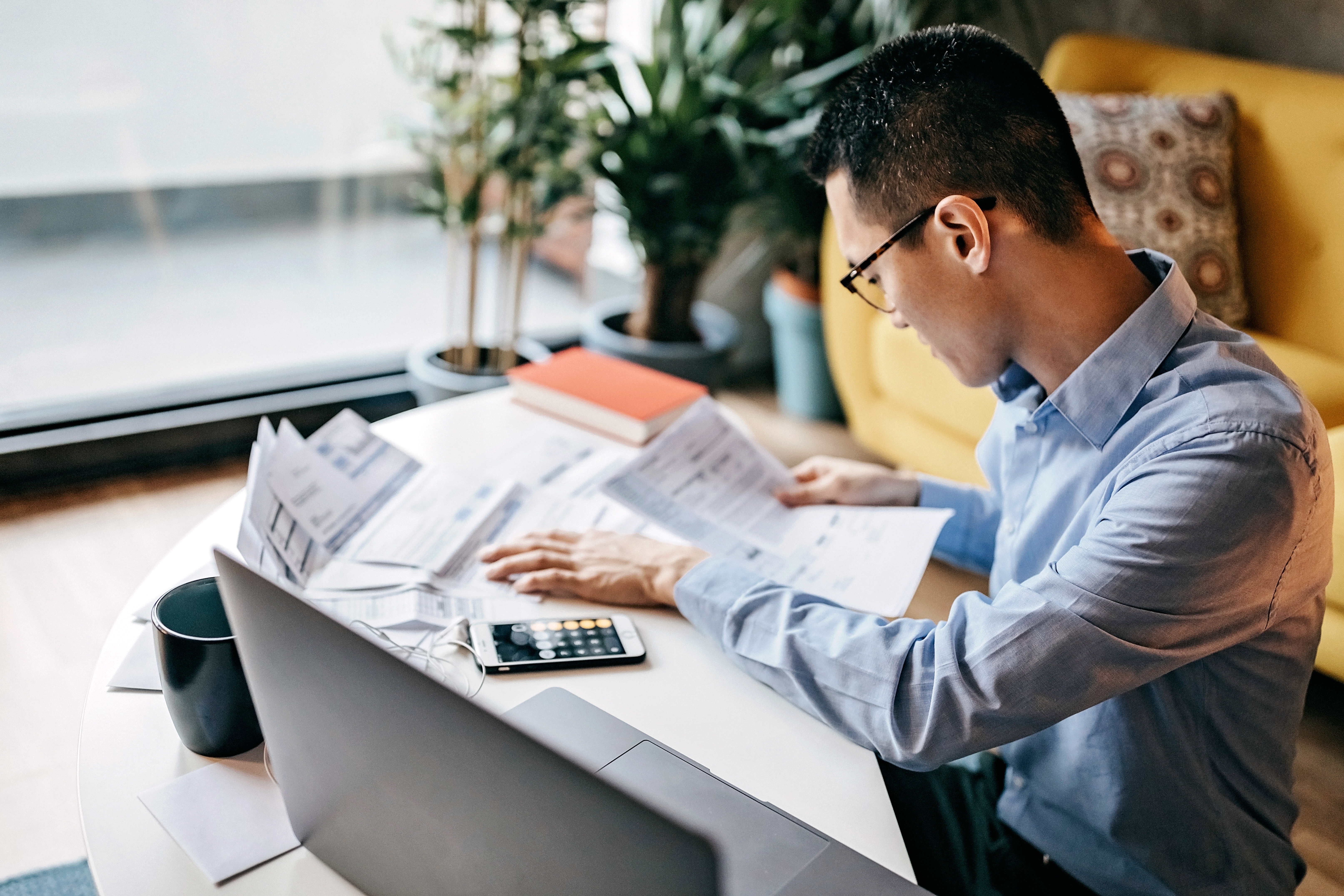 Person looking over business records
