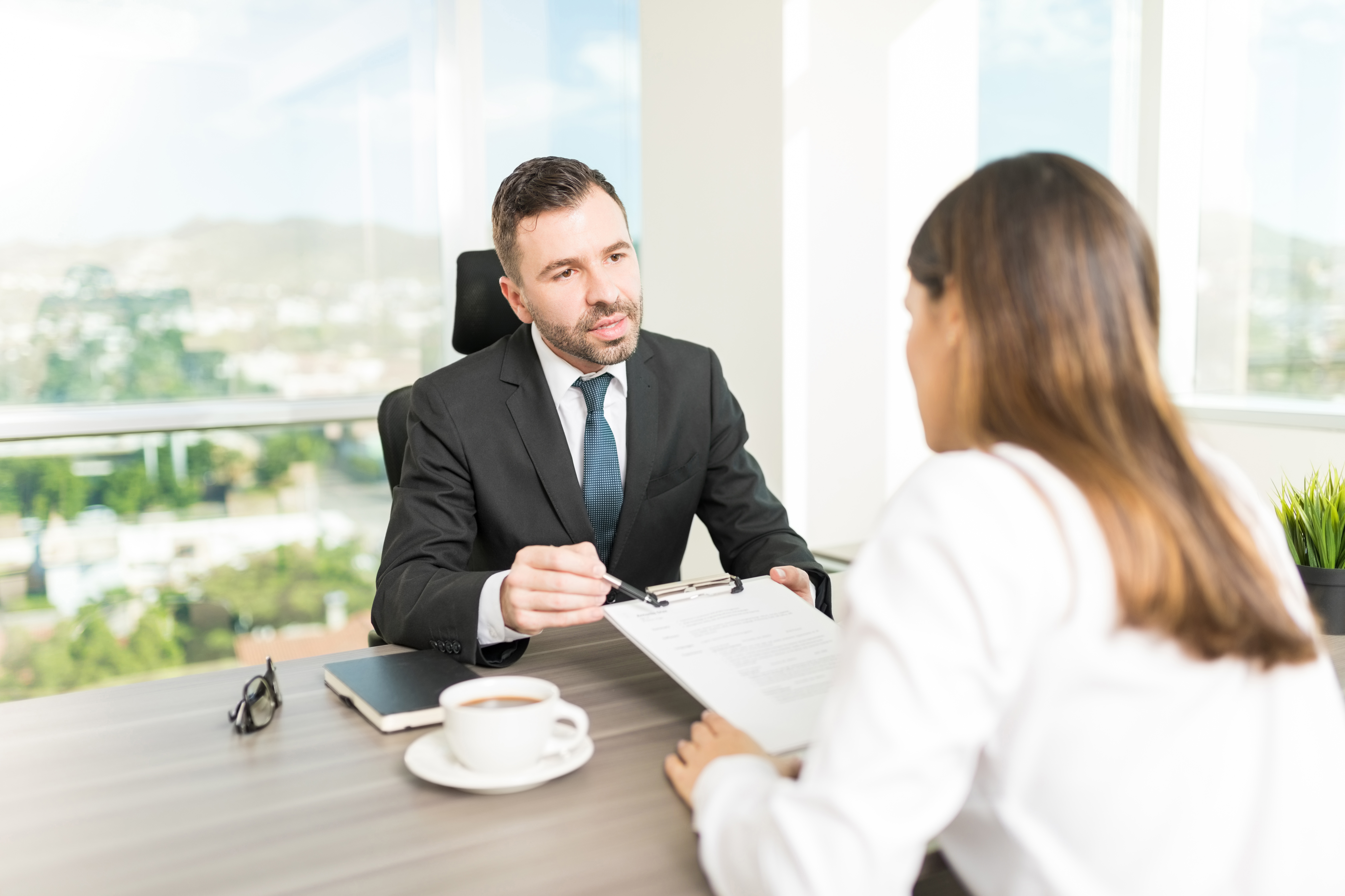 Business owner learning about hold harmless agreement