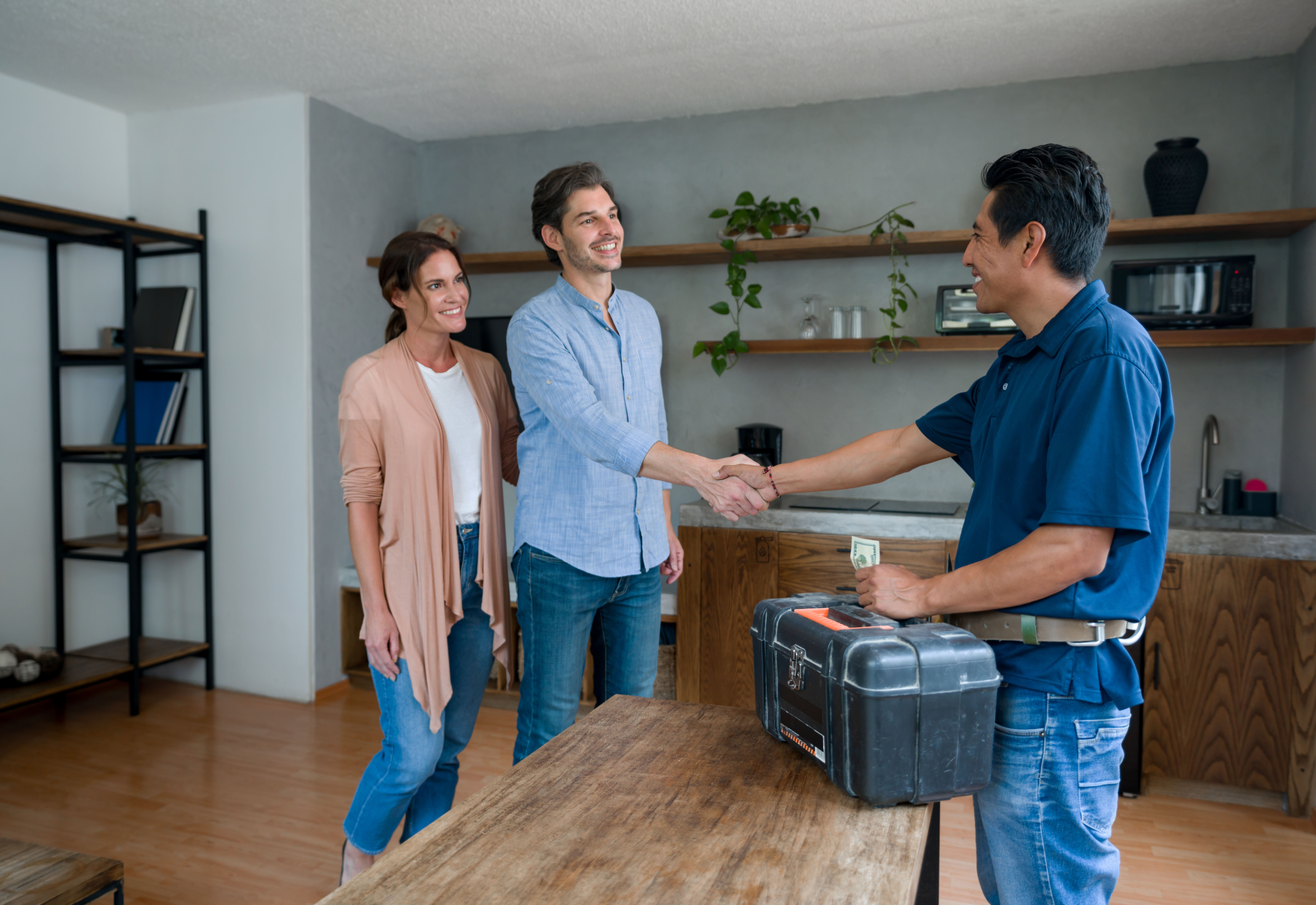 Small business owners strike a deal with a handshake